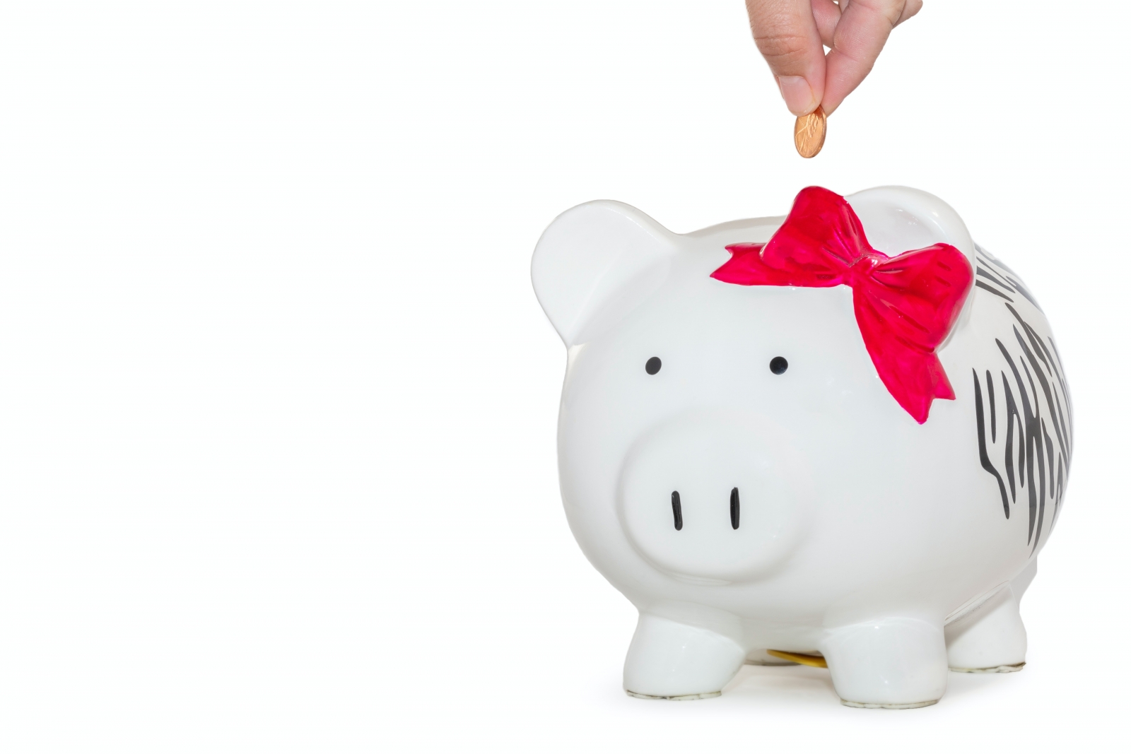 white ceramic piggy bank